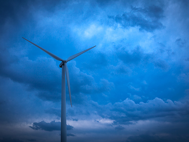 Going green with wind energy on a beautiful, cloudy day.